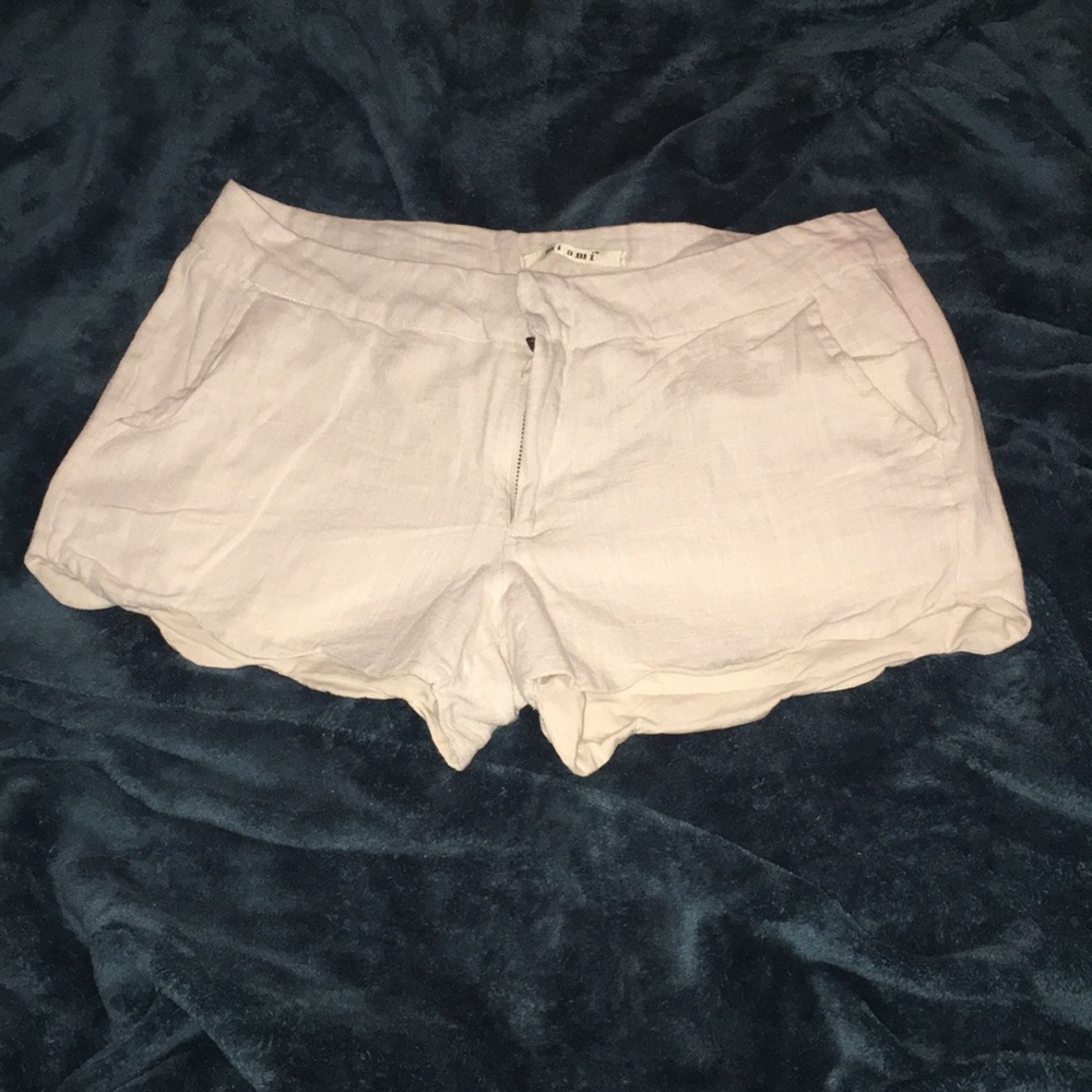 Cream shorts with scalloped bottom